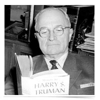 President Truman reading.