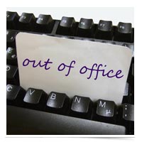 Image of out of office note in keyboard.
