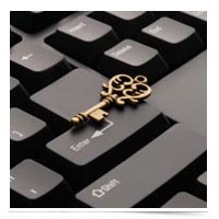 Golden key on a keyboard.