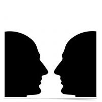 Image of two human silhouettes face to face.