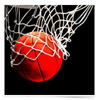 Image of basketball through a hoop.