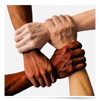 Diverse hands clasped together for strength