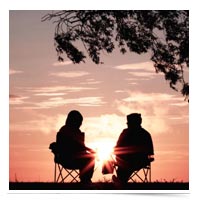 Couple meeting outside.